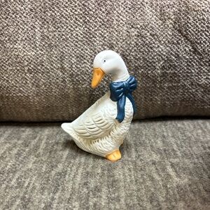 White Ceramic Duck Goose Figurine with Blue Bow 3 1/2 inches tall.